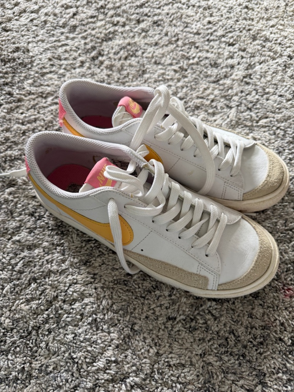 Nike Women’s White Sneakers with Yellow Swoosh and Pink Accents